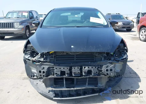 2016 Ford Focus Se z USA, uszkodzony, nr VIN 1FADP3F28GL326411